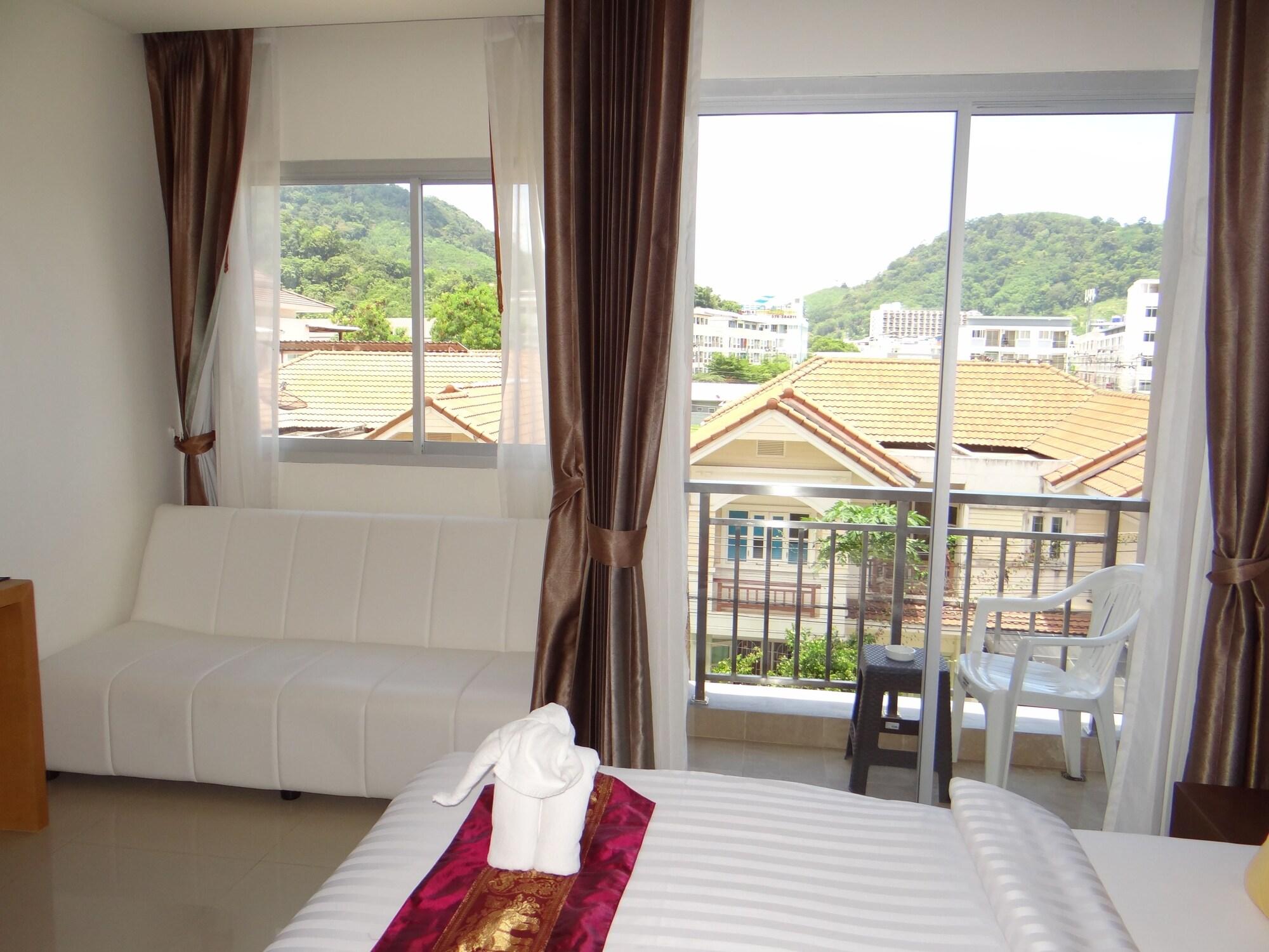 Tropical Sunset Hotel Patong Buitenkant foto